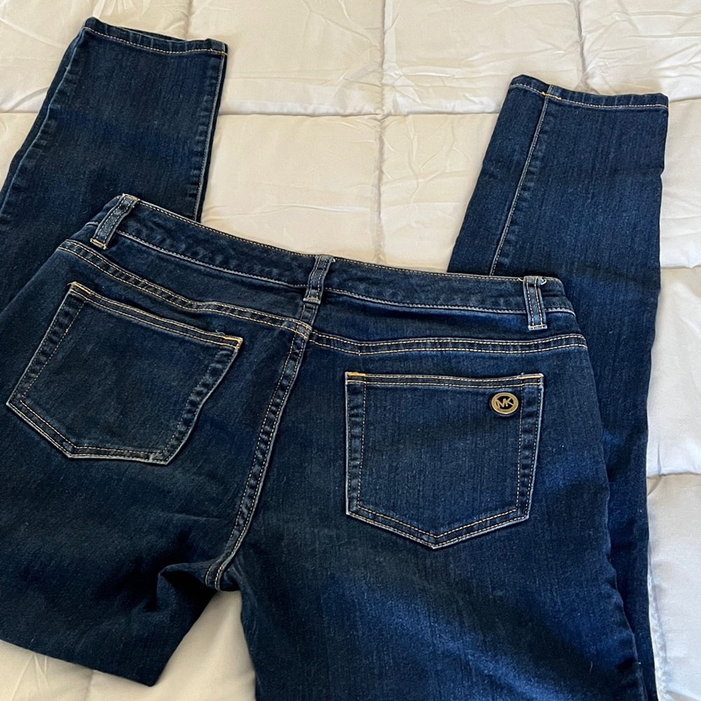 Michael Kors jeans- slim fit throughout leg…nice mid-dark blue hue.